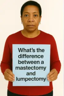 Lumpectomy vs Masectomy Sign Being Held By A Woman